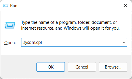 2.	Enter sysdm.cpl in the text field and hit Enter. This will open the System Properties panel